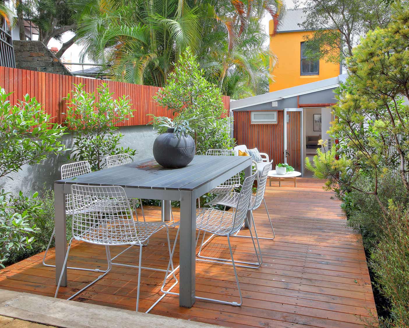 1404x1128-the-bray-8-rear-courtyard-with-oiled-deck-and-low-maintenance-garden